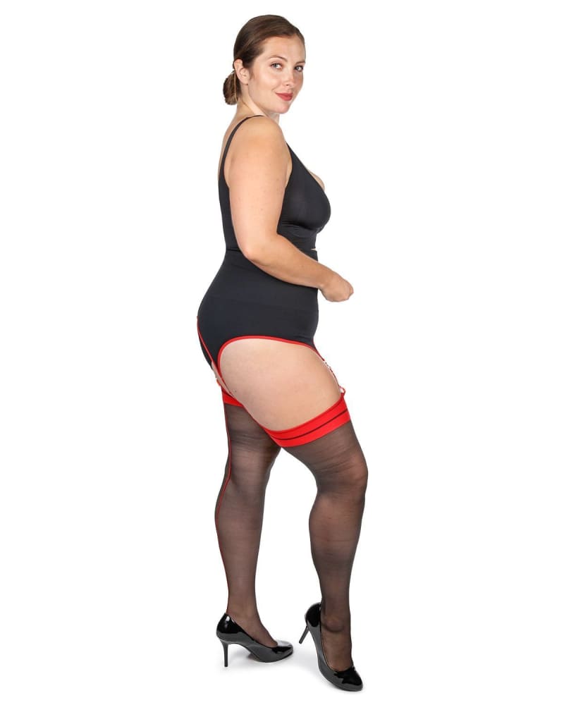 Side of a model wearing a size L-XL Women's Between The Lines 20 Denier Sheer Backseam Stocking in Black-Red by Memoi. | dia_product_style_image_id:299755